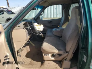 1999 Ford F-150 XL with VIN 1FTRX17L8XKB06509, listed as a Copart auction lot 49062185 with 110,582 mi miles and Salvage Title. Bid and sale history available at carsss.com. Image 7.