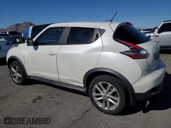 2015 Nissan Juke SV with VIN JN8AF5MVXFT563820, listed as a Copart auction lot 56434305 with 103,265 mi miles and Salvage title. Bid and sale history available at DreamBid. Image 2.
