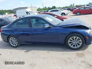 2018 BMW 3 Series 320i with VIN WBA8E1G56JNU92997, listed as a IAAI auction lot 42039869 with 105,085 mi miles. Bid and sale history available at carsss.com. Image 12.