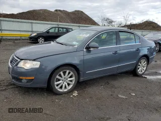 2010 Volkswagen Passat Komfort with VIN WVWJM7AN0AE155924, listed as a Copart auction lot 50957395 with 180,742 mi miles and Salvage title. Bid and sale history available at DreamBid. Image 1.