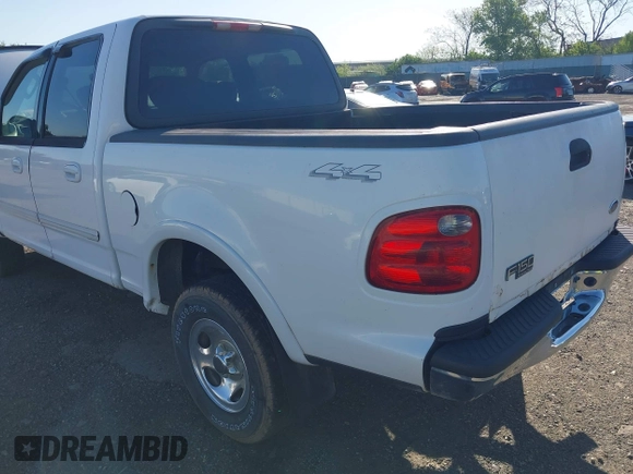 2003 Ford F-150 XLT with VIN 1FTRW08633KD11896, listed as a IAAI auction lot 42137360 with 118,654 mi miles. Bid and sale history available at carsss.com. Image 14.