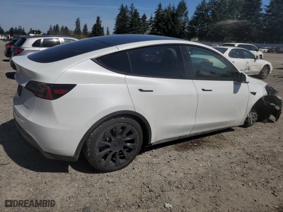 2023 Tesla Model Y Long Range with VIN 7SAYGDEE3PF751019, listed as a Copart auction lot 52716005 with 24,591 mi miles and Salvage Title. Bid and sale history available at carsss.com. Image 3.