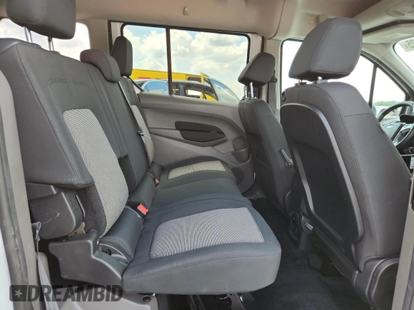 2021 Ford Transit Connect XL z VIN NM0GE9E28M1490263, wystawiony jako Copart lot #61974925 z przebiegiem 10 605 mil mil oraz Nie do naprawy • Non repairable. Historia ofert i sprzedaży dostępna na DreamBid. Obrazek 11.