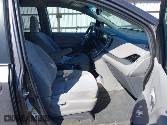 2016 Toyota Sienna LE with VIN 5TDJK3DC9GS130774, listed as a IAAI auction lot 42033495 with 228,289 mi miles. Bid and sale history available at carsss.com. Image 5.