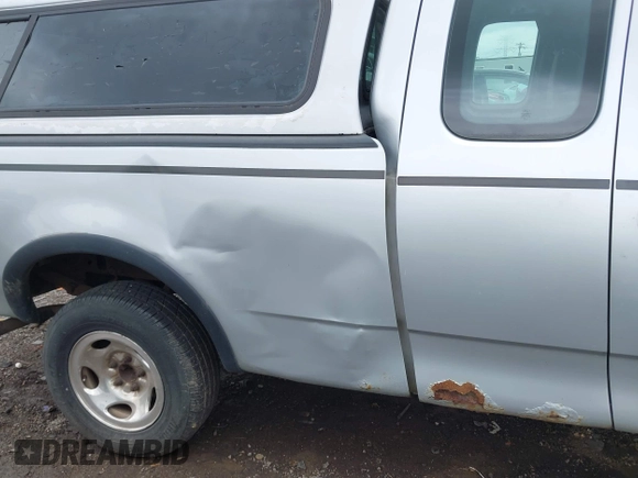 2002 Ford F-150 XL с VIN 1FTRX18L52NB18963, выставлен на аукционе IAAI как лот 42042014 с пробегом 229 262 миль миль и . История ставок и продаж доступна на DreamBid. Изображение 6.