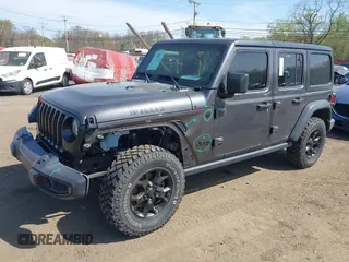 2021 Jeep Wrangler Unlimited Willys with VIN 1C4HJXDG1MW672507, listed as a IAAI auction lot 42084805 with 59,943 mi miles and . Bid and sale history available at DreamBid. Image 19.