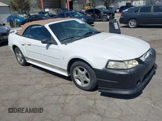 2002 Ford Mustang Deluxe z VIN 1FAFP44492F163567, wystawiony jako IAAI lot #41860428 z przebiegiem 124 726 mil mil oraz . Historia ofert i sprzedaży dostępna na DreamBid. Obrazek 1.