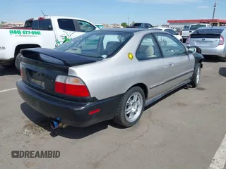 1996 Honda Accord LX with VIN 1HGCD7235TA023971, listed as a IAAI auction lot 42152007 with 183,536 mi miles and . Bid and sale history available at carsss.com. Image 4.
