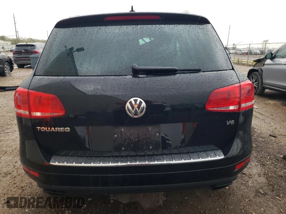 2013 Volkswagen Touareg Lux with VIN WVGEF9BP0DD002814, listed as a Copart auction lot 83015434 with 143,320 mi miles and Salvage Title. Bid and sale history available at DreamBid. Image 6.