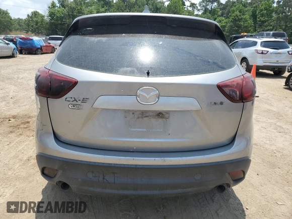 2014 Mazda CX-5 Sport with VIN JM3KE2BE2E0349755, listed as a Copart auction lot 58212375 with Not provided miles and Clean title. Bid and sale history available at DreamBid. Image 6.