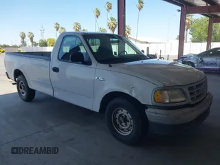 1999 Ford F-150 with VIN 1FTZF1721XKB63483, listed as a IAAI auction lot 42327278 with Not provided miles and . Bid and sale history available at DreamBid. Image 1.