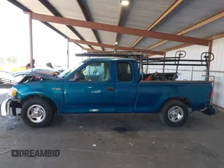 2001 Ford F-150 XL with VIN 1FTZX17281KF04799, listed as a IAAI auction lot 42550320 with Not provided miles and . Bid and sale history available at DreamBid. Image 13.