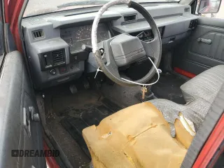 1991 Mitsubishi Mighty Max z VIN JA7FL24W2MP026041, wystawiony jako Copart lot #79159244 z przebiegiem 219 903 mil mil oraz Szkody całkowita. Historia ofert i sprzedaży dostępna na DreamBid. Obrazek 8.