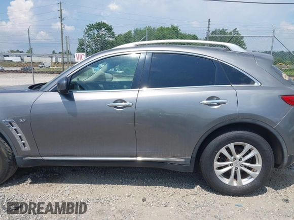 2014 Infiniti QX70 with VIN JN8CS1MW5EM411653, listed as a IAAI auction lot 42690935 with 110,806 mi miles and . Bid and sale history available at DreamBid. Image 14.