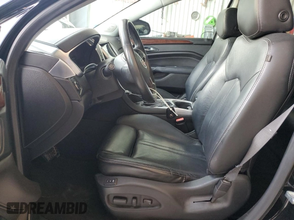 2015 Cadillac SRX Performance Collection with VIN 3GYFNCE34FS631491, listed as a Copart auction lot 64109575 with 102,763 mi miles and Salvage title. Bid and sale history available at DreamBid. Image 7.