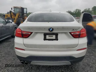 2015 BMW X4 xDrive28i z VIN 5UXXW3C53F0M87109, wystawiony jako Copart lot #54507325 z przebiegiem 115 989 mil mil oraz Tytuł czysty. Historia ofert i sprzedaży dostępna na DreamBid. Obrazek 6.