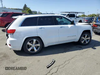 2015 Jeep Grand Cherokee High Altitude с VIN 1C4RJFCM2FC215232, выставлен на аукционе Copart как лот 60002875 с пробегом 122 813 миль миль и Списание • Salvage title. История ставок и продаж доступна на DreamBid. Изображение 3.