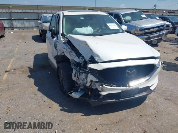 2019 Mazda CX-5 Touring with VIN JM3KFACM7K1656311, listed as a IAAI auction lot 41833187 with 83,888 mi miles. Bid and sale history available at carsss.com. Image 1.