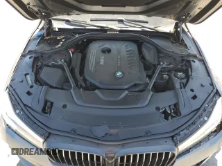 2018 BMW 7 Series 740i with VIN WBA7E2C59JG742809, listed as a Copart auction lot 66995934 with 62,017 mi miles and Salvage Title. Bid and sale history available at carsss.com. Image 12.