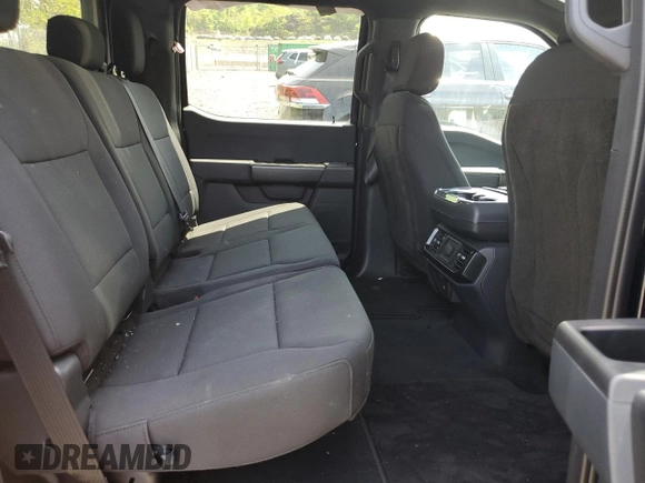 2023 Ford F-150 with VIN 1FTFW1P83PKE89261, listed as a Copart auction lot 56625325 with 9,079 mi miles and Salvage title. Bid and sale history available at DreamBid. Image 10.