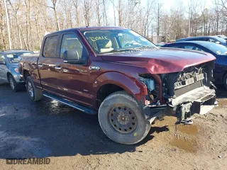 2015 Ford F-150 XLT w/HD Payload Pkg with VIN 1FTFW1EG9FFC44739, listed as a IAAI auction lot 41193582 with 121,169 mi miles. Bid and sale history available at carsss.com. Image 1.