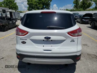 2014 Ford Escape SE z VIN 1FMCU9GX6EUA86354, wystawiony jako Copart lot #63978135 z przebiegiem 178 107 mil mil oraz Czysty tytuł • Clean title. Historia ofert i sprzedaży dostępna na DreamBid. Obrazek 6.