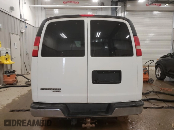 2014 Chevrolet Express Passenger LT with VIN 1GAZG1FG4E1176590, listed as a Copart auction lot 83660024 with 167,653 mi miles and Salvage title. Bid and sale history available at DreamBid. Image 6.