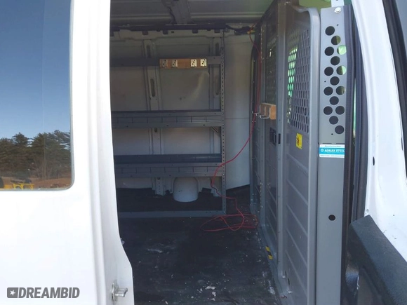 2017 Chevrolet Express Cargo Van with VIN 1GCWGAFF9H1171553, listed as a IAAI auction lot 41005738 with 131,621 mi miles. Bid and sale history available at carsss.com. Image 8.