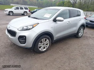 2017 Kia Sportage LX with VIN KNDPMCAC1H7140218, listed as a IAAI auction lot 42024024 with 129,799 mi miles. Bid and sale history available at carsss.com. Image 2.