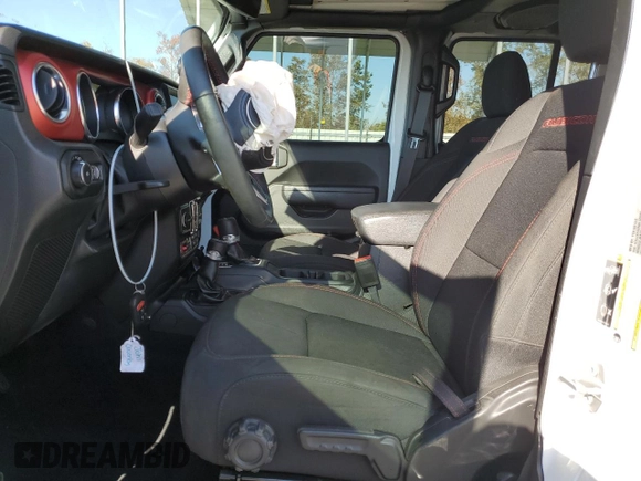 2022 Jeep Wrangler Unlimited Rubicon with VIN 1C4JJXFG2NW125360, listed as a Copart auction lot 76773624 with 22,978 mi miles and Salvage title. Bid and sale history available at DreamBid. Image 7.
