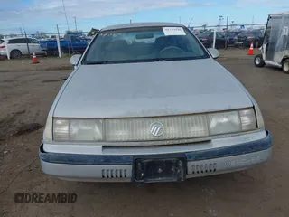1991 Mercury Sable z VIN 1MECM50U6MG615570, wystawiony jako IAAI lot #41742946 z przebiegiem 19 426 mil mil oraz . Historia ofert i sprzedaży dostępna na DreamBid. Obrazek 6.