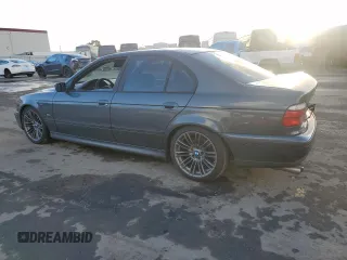 2000 BMW 5 Series 540i with VIN WBADN5348YGC95477, listed as a Copart auction lot 87242764 with 135,424 mi miles and Salvage Title. Bid and sale history available at carsss.com. Image 2.