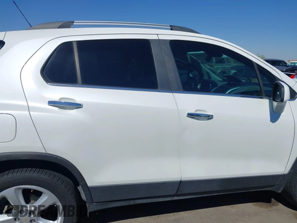 2015 Chevrolet Trax LTZ with VIN KL7CJTSBXFB236823, listed as a IAAI auction lot 42045817 with 138,930 mi miles. Bid and sale history available at carsss.com. Image 14.