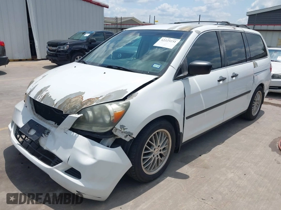 2007 Honda Odyssey LX with VIN 5FNRL382X7B135892, listed as a IAAI auction lot 42223231 with 204,054 mi miles and . Bid and sale history available at DreamBid. Image 2.
