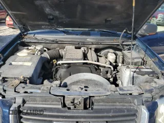 2004 GMC Envoy SLT with VIN 1GKDS13S042311327, listed as a Copart auction lot 42736995 with 235,164 mi miles and Salvage Title. Bid and sale history available at carsss.com. Image 12.
