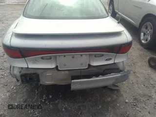 2002 Ford Escort ZX2 Standard z VIN 3FAFP11382R230057, wystawiony jako IAAI lot #42338923 z przebiegiem 111 587 mil mil oraz . Historia ofert i sprzedaży dostępna na DreamBid. Obrazek 6.