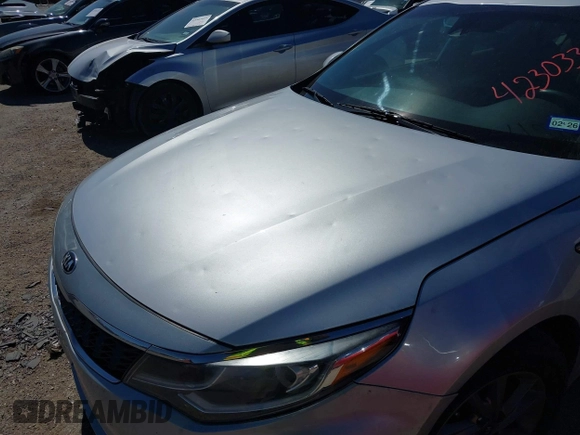2019 Kia Optima LX with VIN 5XXGT4L3XKG294060, listed as a IAAI auction lot 42303397 with 127,081 mi miles and . Bid and sale history available at DreamBid. Image 6.