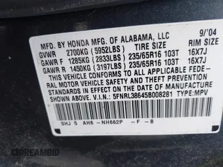2005 Honda Odyssey EX-L with VIN 5FNRL38645B008281, listed as a IAAI auction lot 41985052 with 219,693 mi miles. Bid and sale history available at carsss.com. Image 9.
