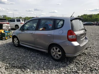 2007 Honda Fit Sport z VIN JHMGD37677S001013, wystawiony jako Copart lot #58792605 z przebiegiem 157 960 mil mil oraz Czysty tytuł • Clean title. Historia ofert i sprzedaży dostępna na DreamBid. Obrazek 2.