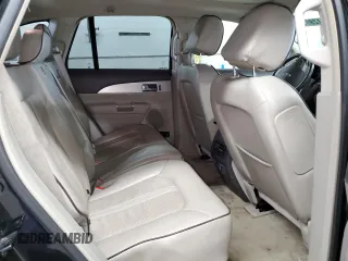 2013 Lincoln MKX z VIN 2LMDJ8JK7DBL05609, wystawiony jako Copart lot #60129615 z przebiegiem 210 678 mil mil oraz Czysty tytuł • Clean title. Historia ofert i sprzedaży dostępna na DreamBid. Obrazek 11.
