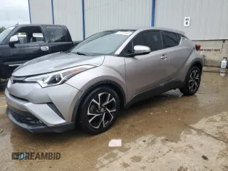 2018 Toyota C-HR XLE with VIN NMTKHMBXXJR038237, listed as a Copart auction lot 61237465 with 136,065 mi miles and Salvage title. Bid and sale history available at DreamBid. Image 1.