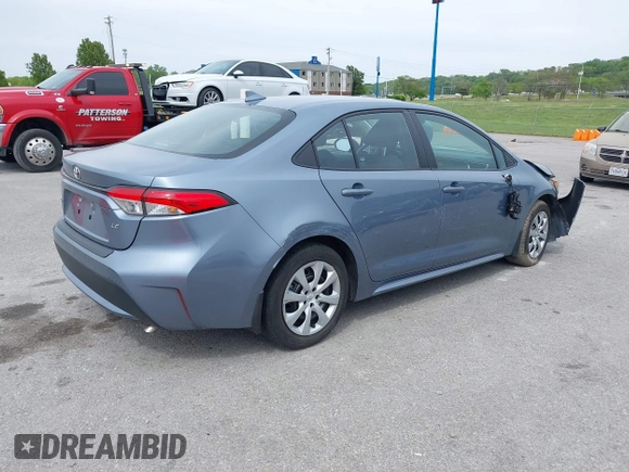 2022 Toyota Corolla LE with VIN 5YFEPMAE9NP349268, listed as a IAAI auction lot 39291224 with 52,228 mi miles. Bid and sale history available at carsss.com. Image 4.