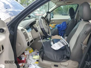 2008 Mercury Mariner Premier z VIN 4M2CU97128KJ17304, wystawiony jako Copart lot #55965555 z przebiegiem 134 473 mil mil oraz Szkoda całkowita • Salvage title. Historia ofert i sprzedaży dostępna na DreamBid. Obrazek 7.