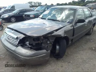 2003 Ford Crown Victoria LX z VIN 2FAFP74W73X191537, wystawiony jako IAAI lot #41711046 z przebiegiem 195 527 mil mil oraz . Historia ofert i sprzedaży dostępna na DreamBid. Obrazek 6.
