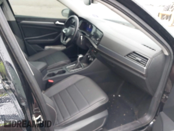 2023 Volkswagen Jetta SE with VIN 3VW7M7BU9PM013345, listed as a IAAI auction lot 42203990 with 15,859 mi miles and . Bid and sale history available at DreamBid. Image 5.