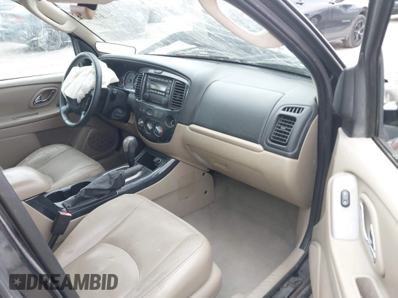 2005 Mazda Tribute S with VIN 4F2YZ96145KM32776, listed as a IAAI auction lot 42159162 with 200,416 mi miles and . Bid and sale history available at DreamBid. Image 5.