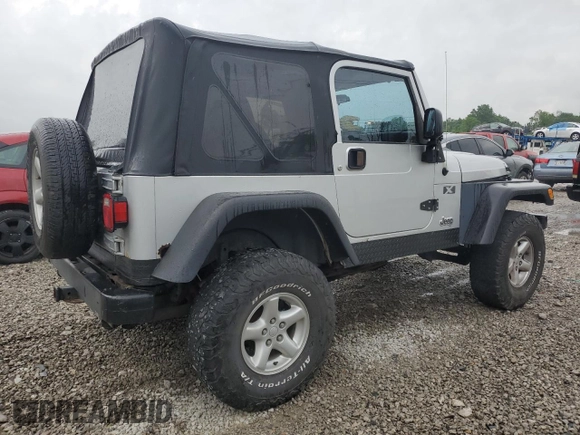 2004 Jeep Wrangler X with VIN 1J4FA39S24P714961, listed as a Copart auction lot 57871235 with 123,164 mi miles and Clean title. Bid and sale history available at DreamBid. Image 3.