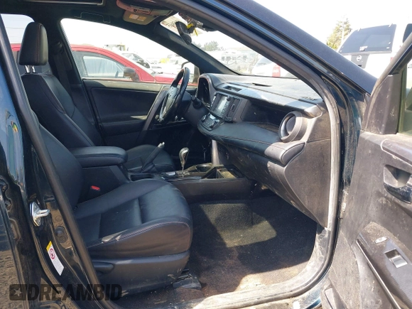 2018 Toyota RAV4 Hybrid SE with VIN JTMJJREV9JD191552, listed as a IAAI auction lot 42158665 with 84,025 mi miles and . Bid and sale history available at DreamBid. Image 5.
