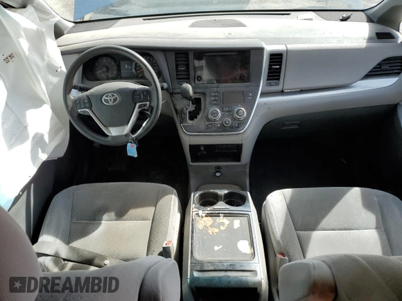 2015 Toyota Sienna LE AAS with VIN 5TDKK3DC7FS652662, listed as a Copart auction lot 49272325 with 129,652 mi miles and Salvage Title. Bid and sale history available at DreamBid. Image 8.