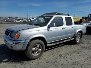 2000 Nissan Frontier XE z VIN 1N6ED27Y9YC358576, wystawiony jako Copart lot #50545585 z przebiegiem 264 002 mil mil oraz Czysty tytuł • Clean title. Historia ofert i sprzedaży dostępna na DreamBid. Obrazek 1.